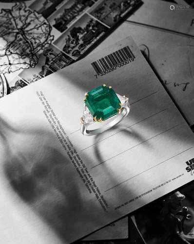 A Fine Emerald and Diamond Ring