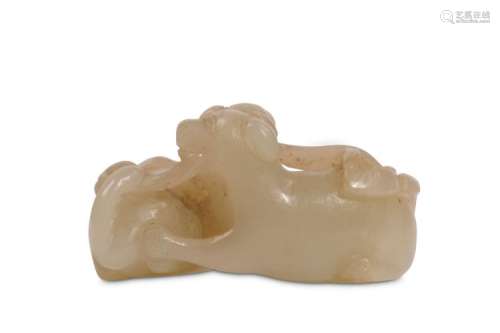 A CHINESE JADE ‘DOG GROUP’ CARVING. Qing Dynasty.