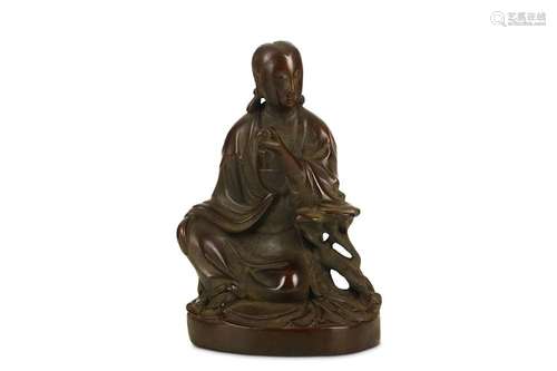 A CHINESE SILVER-INLAID BRONZE MODEL OF GUANYIN. T