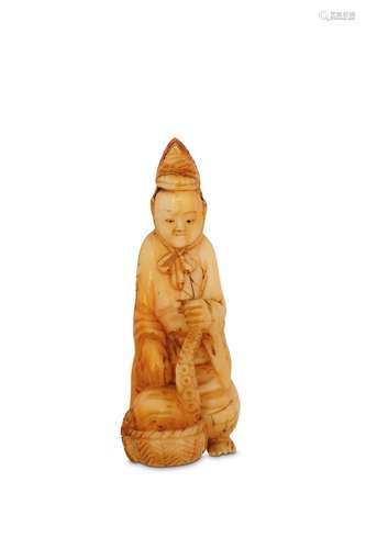 A MARINE IVORY NETSUKE OF A FISHERMAN AND AN OCTOP