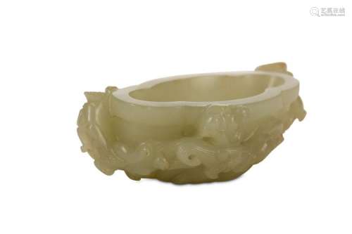A CHINESE CARVED JADE ‘CHILONG’ WASHER. Qing Dynas