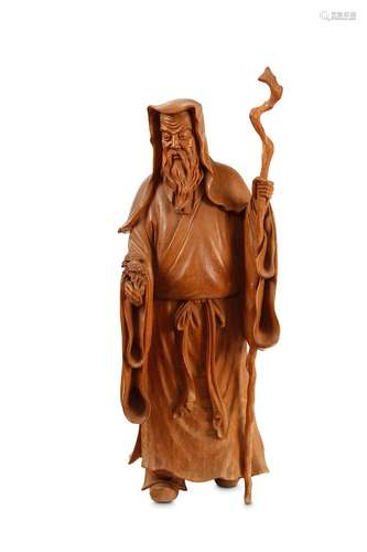 A CARVED WOOD FIGURE OF A SAGE. 20th Century. Wear