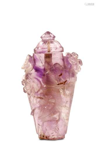 AN AMETHYST SNUFF BOTTLE TOGETHER WITH A ROCK CRYS