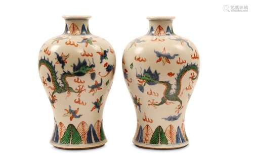 A PAIR OF WUCAI 'DRAGON AND PHOENIX' VASES. 19th /