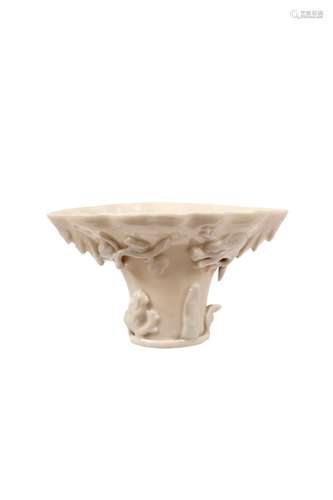 A BLANC DE CHINE LIBATION CUP. 17th Century. Depic