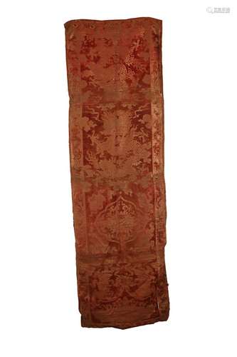 A CUT RED VELVET ‘DRAGON’ CHAIR COVER. Early Qing