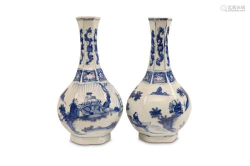 A PAIR OF CHINESE BLUE AND WHITE VASES. Transition