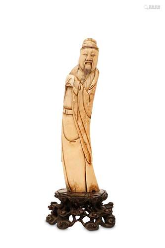 AN IVORY CARVING OF A SCHOLAR. Ming Dynasty. Stand