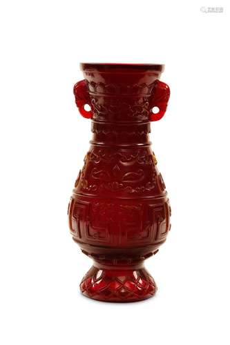 A PEKING GLASS RED VASE. 20th Century. The pear-sh