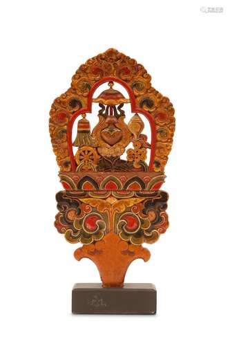 A TORMA ‘EIGHT BUDDHIST EMBLEMS’ PLAQUE. 19th Cent