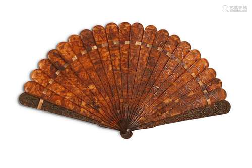 A CARVED TORTOISE SHELL FAN. Qing Dynasty. Incised