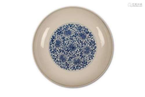 A CHINESE BLUE AND WHITE ‘PEONY SCROLL’ DISH. Qing