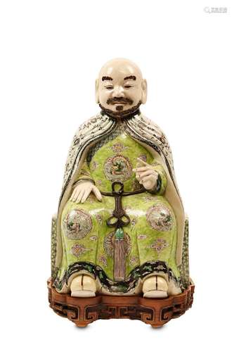 A LARGE CHINESE FAMILLE VERTE MODEL OF A LOHAN. Qi