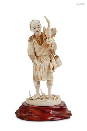 AN IVORY FIGURE OF A CORMORANT FISHERMAN Meiji per