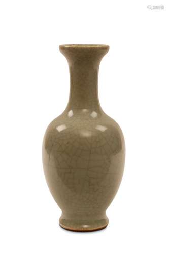 A CHINESE CELADON-GLAZED VASE. The extended globul