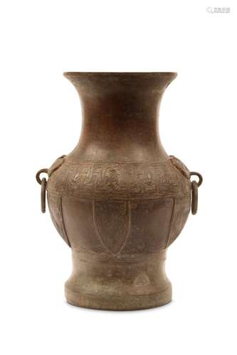 A BRONZE VASE, HU. Ming Dynasty. Decorated with an