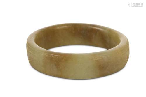 A CHINESE CARVED JADE ‘TAOTIE MASK’ BANGLE. 17th /