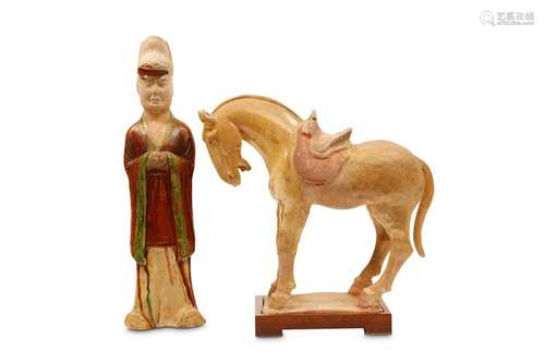 A SANCAI GLAZED FIGURE TOGETHER WITH A HORSE. Tang