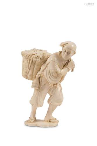 A FINE IVORY OKIMONO OF A FARMER. Meiji period. Th