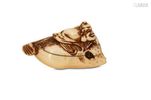 A NETSUKE OF A MAN ON A FISH. 19th Century. Possib