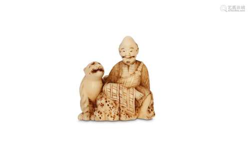 A MARINE IVORY NETSUKE OF A PRIEST AND A TIGER. 19