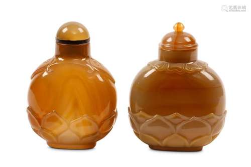 TWO CHINESE GLASS SNUFF BOTTLES. Of flattened circ