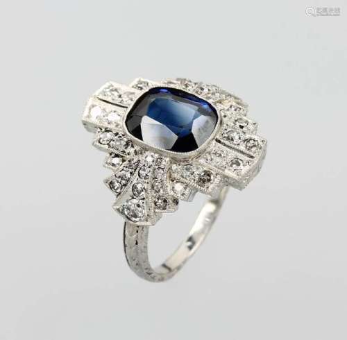 Platinum ring with sapphire and diamonds