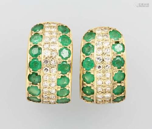 Pair of 14 kt gold earrings with emeralds and
