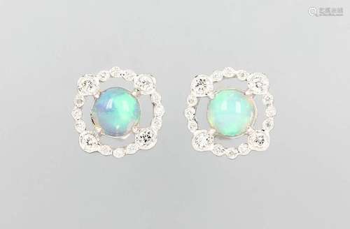 Pair of 18 kt gold earrings with opal and diamonds