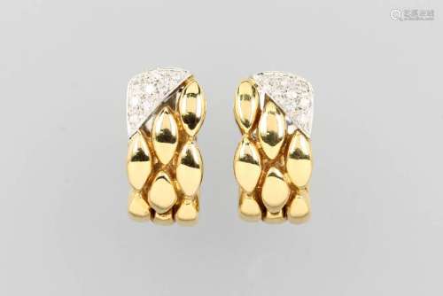 Pair of 18 kt gold hoop earrings with diamonds