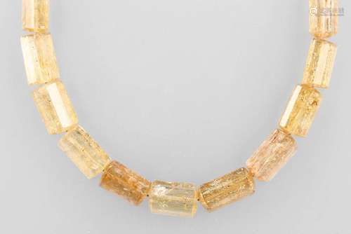 Strand made of imperial topaz