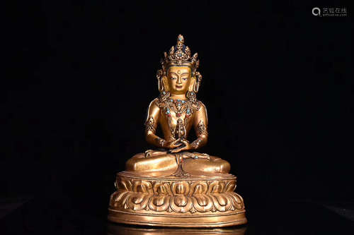 A EIGHTEENTH CENTURY TIBETAN GILT BRONZE BUDDHA STATUE