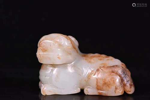 A QING DYNASTY HETIAN JADE SEED MATERIAL BEAST