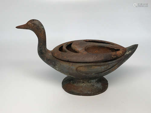 A CAST IRON DUCK SHAPE HONG DEVICE