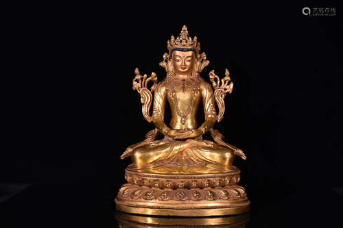 A 17TH CENTURY GILT BRONZE FO STATUE