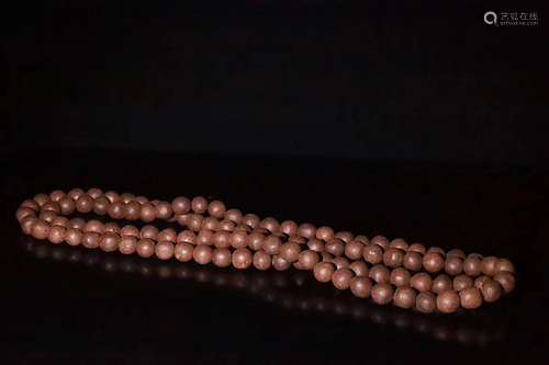 A STRING OF QING DYNASTY BLENDING PRAYER BEADS