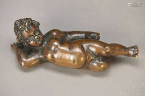 Sculpture of a lying cupid