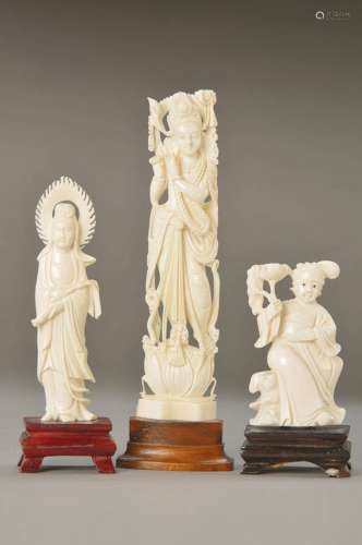 three ivory figurines