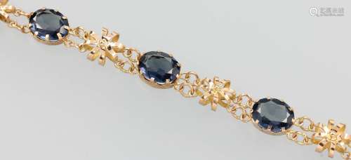 14 kt gold bracelet with synth. alexandrites