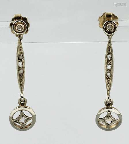 Pair of 14 kt gold earrings with diamonds