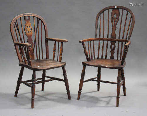 A 20th century ash and elm wheel back Windsor armchair