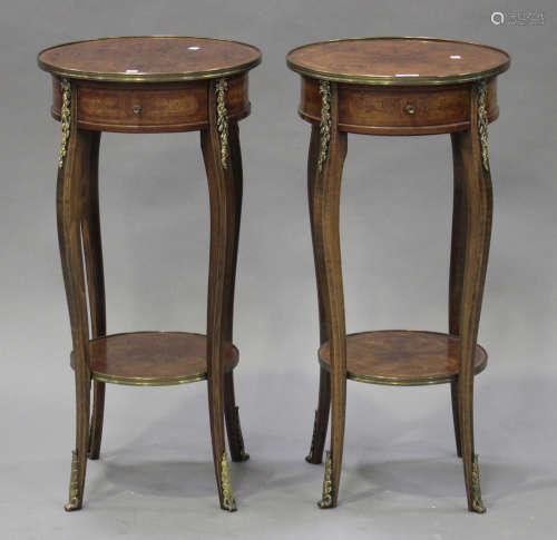 A pair of 20th century Louis XVI style kingwood and marquetry inlaid lamp tables with gilt metal mounts