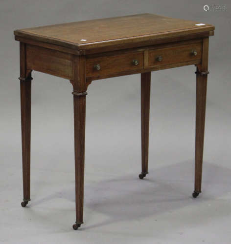An Edwardian mahogany and satinwood crossbanded fold-over card table