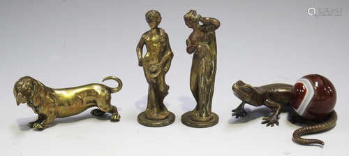 A late Victorian menu holder in the form of a bronze lizard