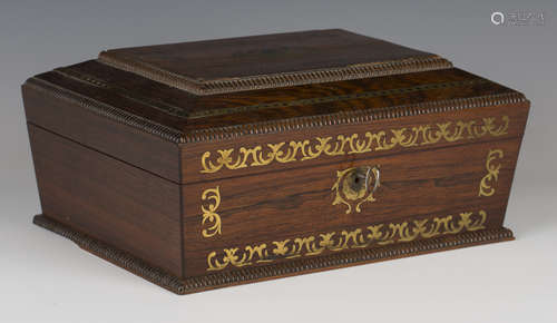 A Regency rosewood and brass inlaid work box of sarcophagus form