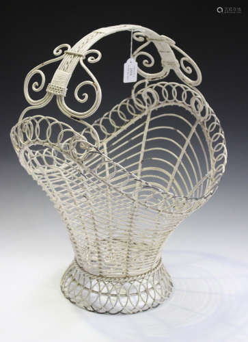 A pair of 20th century white painted wirework baskets with overhead handles