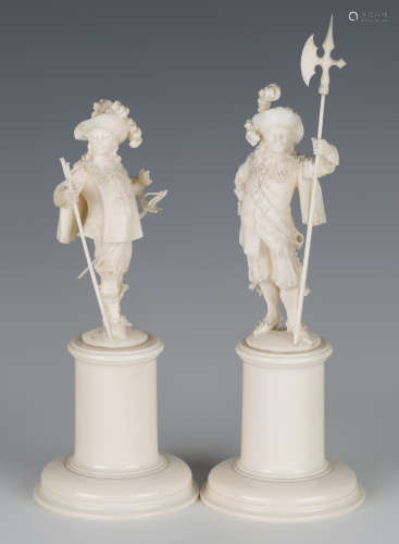 A pair of late 19th century French Dieppe carved ivory figures of medieval cavaliers