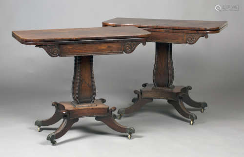 A pair of Regency rosewood fold-over tea tables