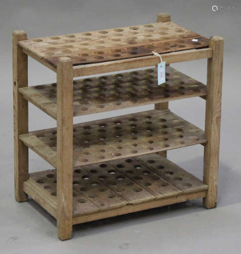 An early 20th century pine four-tier egg stand