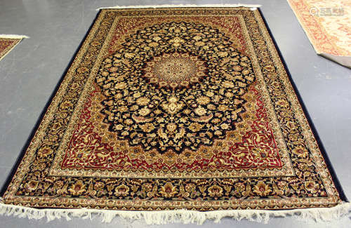 A modern machine made Kashan style carpet